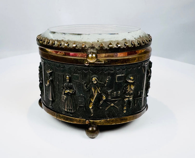 Antique French casket with detailed figures, furniture, and architectural scenes