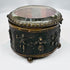 Open antique French casket displaying its surviving period textile lining