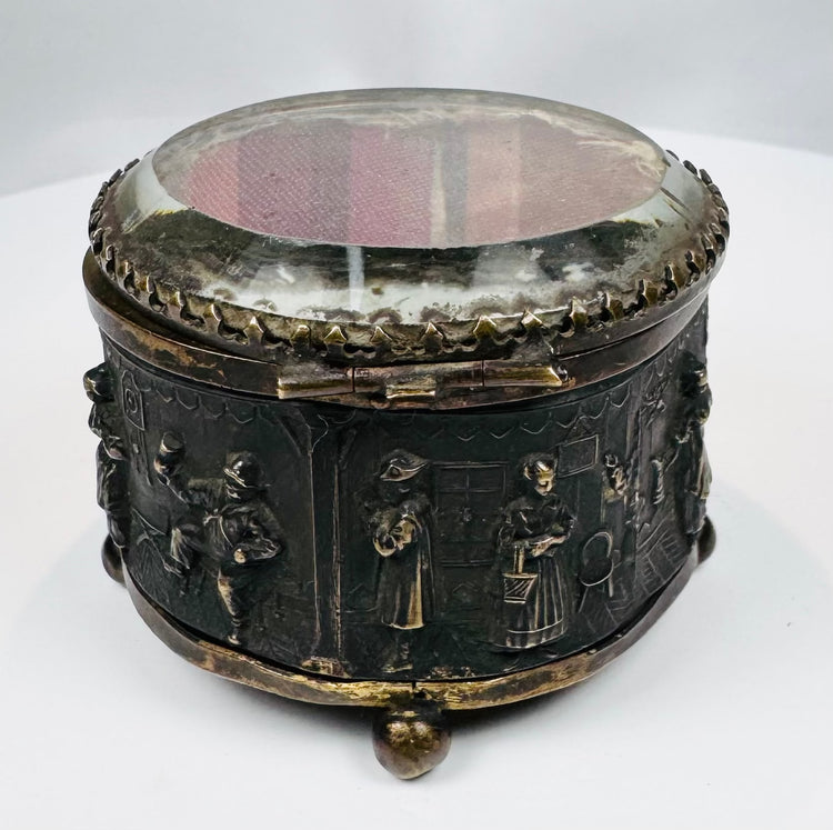 Small spherical clasp and ornate metalwork on a French jewelry casket