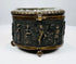 Victorian-era French metal casket with bas-relief tavern scene