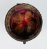 Original red and golden-orange textile interior of antique jewelry casket