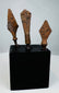 Roman iron arrowheads and javelin points mounted for display