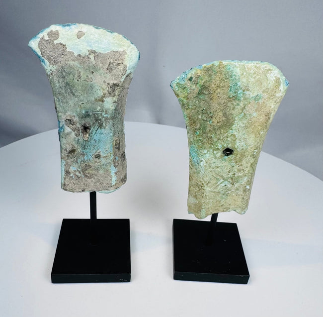 Ancient Vietnamese bronze axe heads with flaring cutting edges