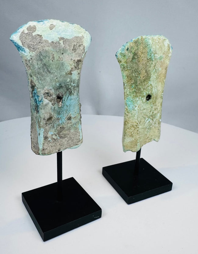 Dong Son bronze axe heads showing distinct cast forms
