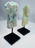 Archaeological bronze axes with green and blue-green patina