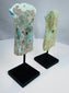 Archaeological bronze axes with green and blue-green patina