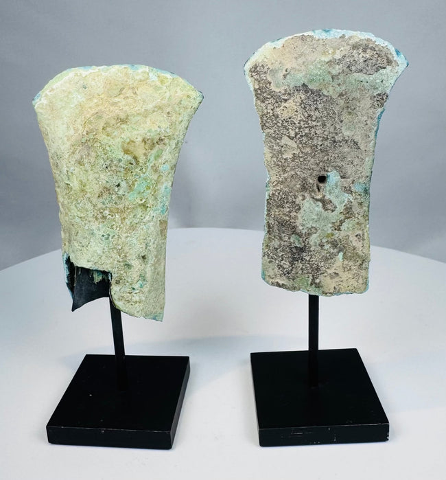 Ancient Southeast Asian socketed bronze axe head pair