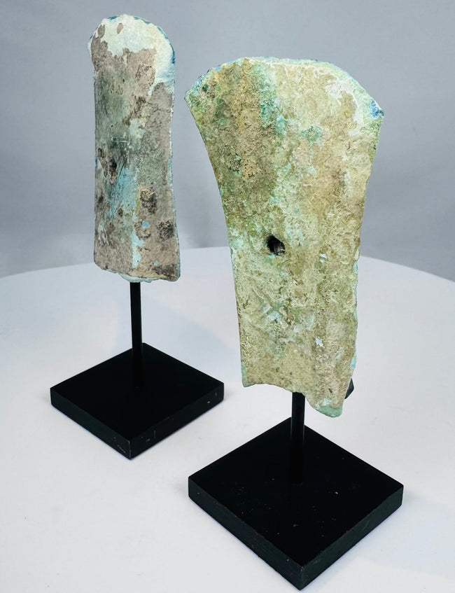 Dong Son Culture bronze axes mounted on black display stands