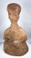 Rear view of ancient Chinese terracotta tomb figure