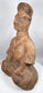 Han Dynasty terracotta figure with hands positioned across lap