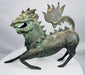 Front view of an antique Chinese horned qilin sculpture
