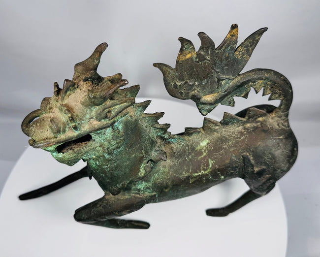 Chinese bronze qilin with a pronounced mane and dorsal spines