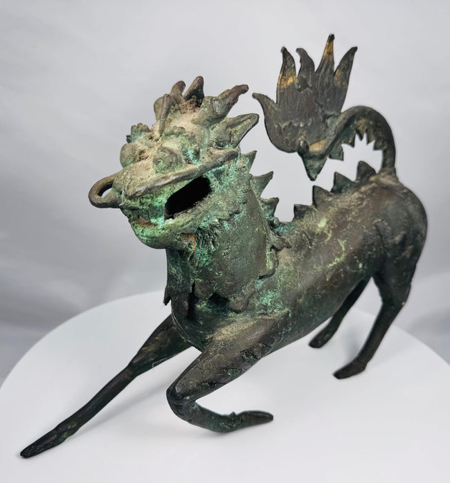 Chinese bronze qilin mythical beast with green and brown patina