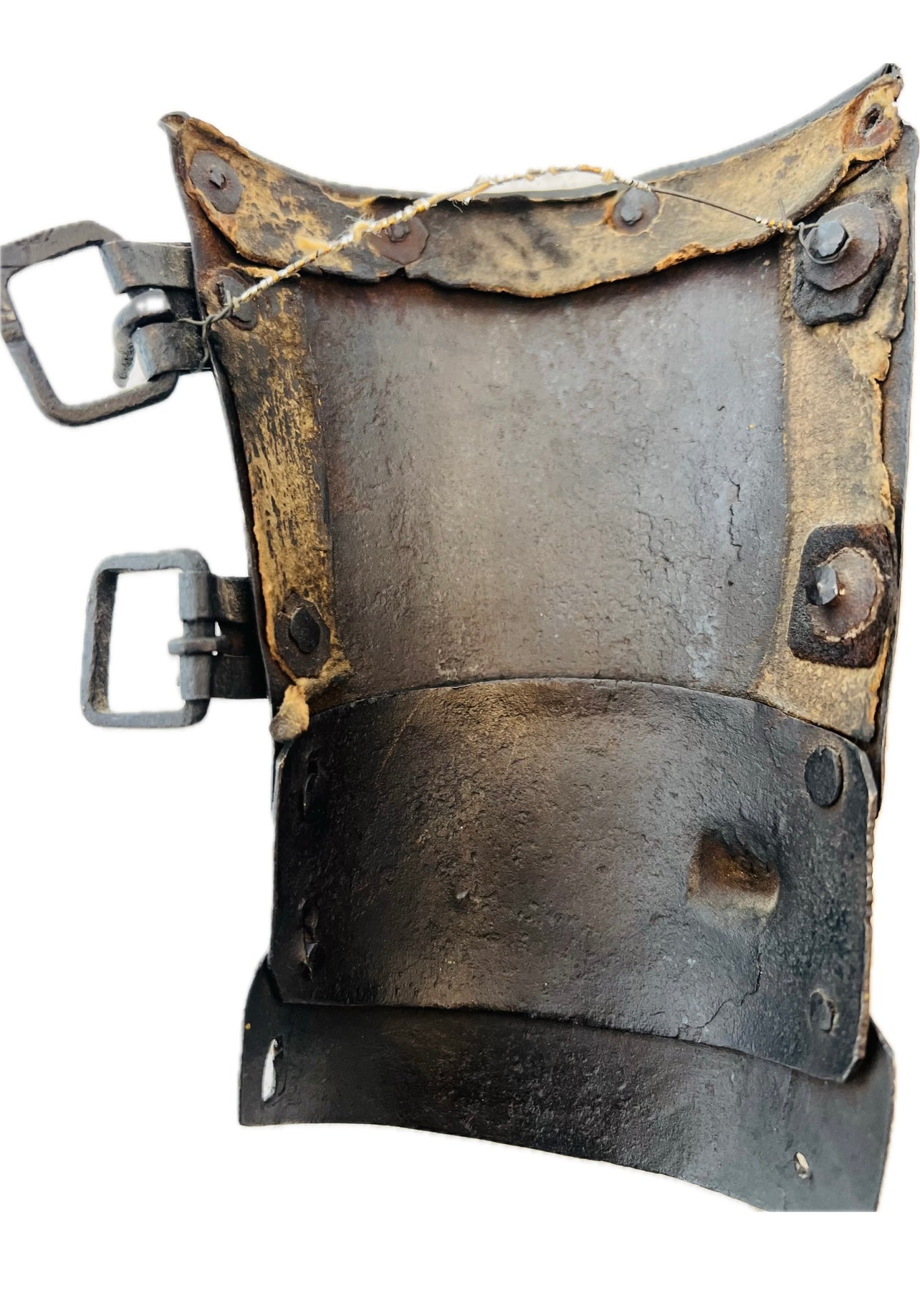 Underside of 15th–16th century continental armour vambrace with original leather straps and rivets, displayed against a white background.