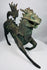 Detail of the flame-shaped tail on a Chinese bronze qilin