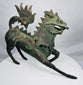 Side profile of a Chinese bronze qilin with an arched tail