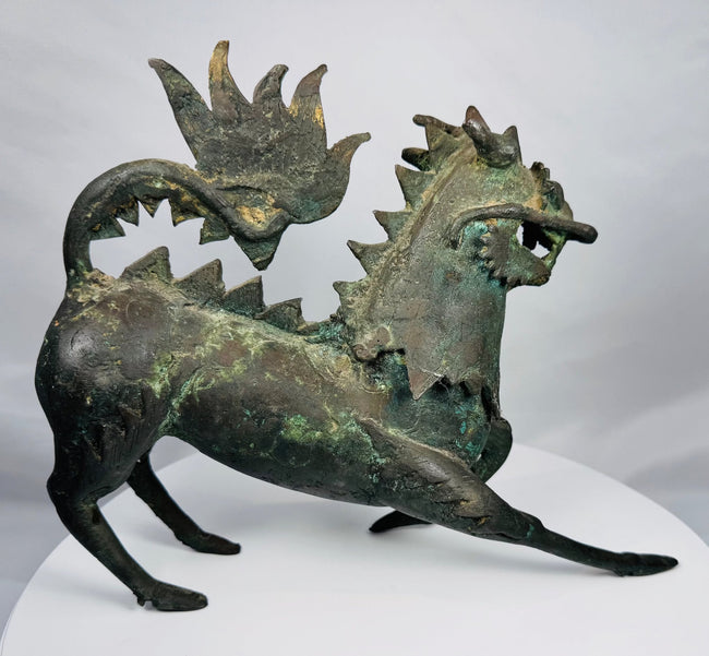Late Qing Dynasty bronze qilin with dragon-like facial features