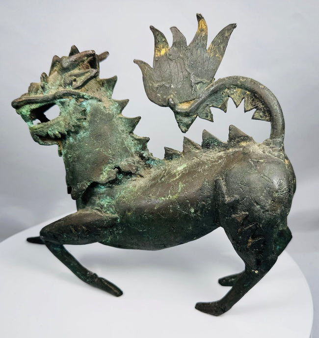 Detail of the horned head on an antique bronze qilin