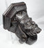 Antique carved wood bracket depicting a medieval-style ruler