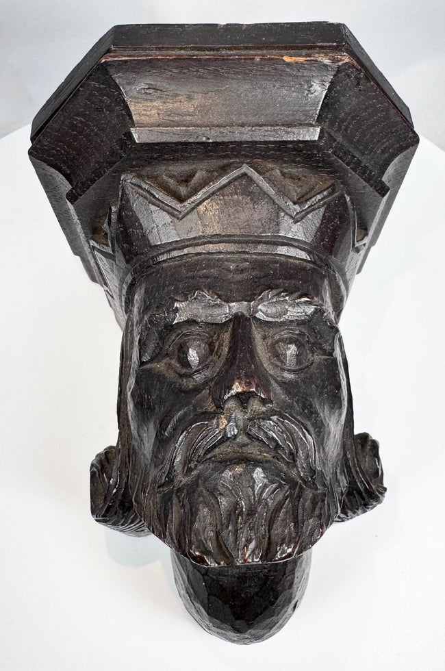 Side view of a 19th-century carved wooden architectural bracket