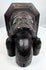 Gothic Revival wood carving with geometric chevron decoration