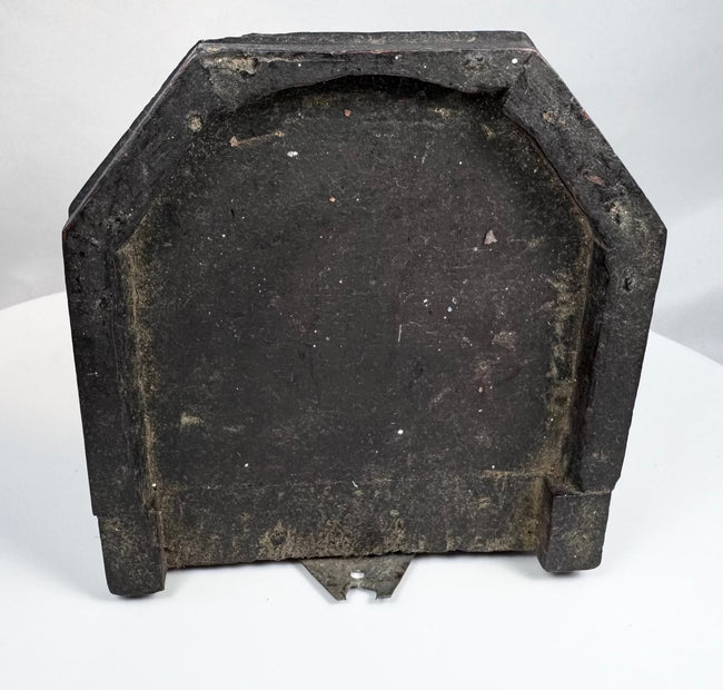 Underside of a hand-carved 19th-century wooden bracket