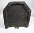 Underside of a hand-carved 19th-century wooden bracket