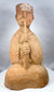 Han Dynasty terracotta musician playing a long wind instrument