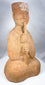 Detail of the tall headdress on a Han Dynasty musician figure