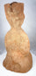 Archaeological terracotta figure with buff-orange surface deposits