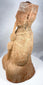 Profile of an ancient Chinese musician holding a vertical pipe