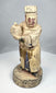 Aged Chinese temple figure with flaking cream and red pigment