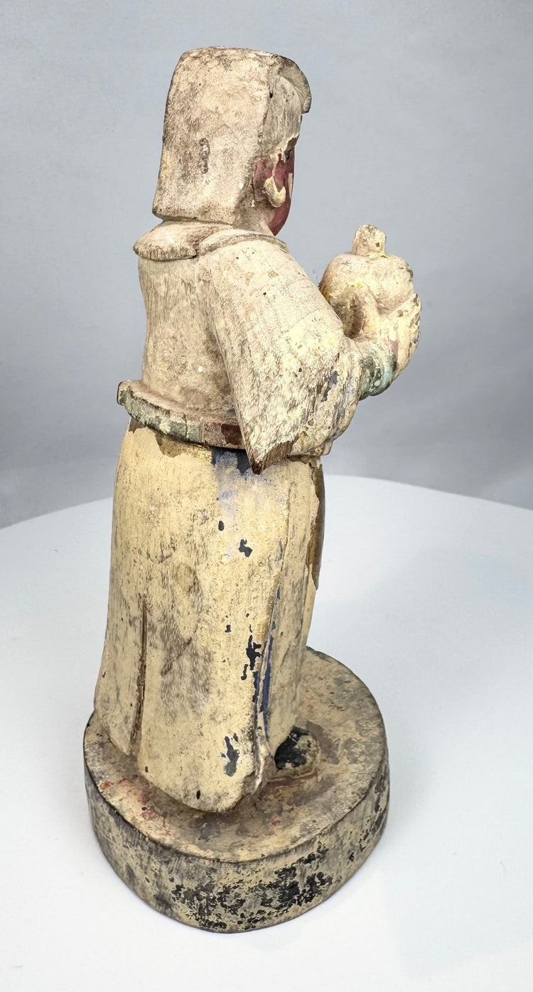 Polychrome Chinese religious sculpture with red and blue pigment
