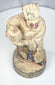 Underside of a hand-carved Chinese wooden attendant figure