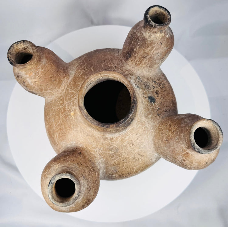 Ancient Mexican pottery featuring a symmetrical radial construction
