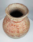 Archaeological ceramic vessel with surviving red mineral pigment