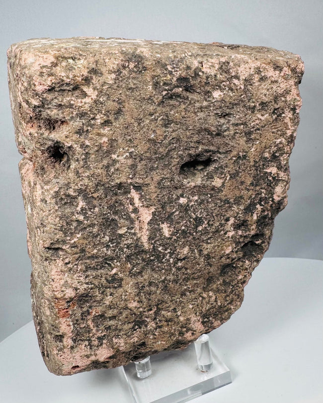 Reverse of an ancient Veracruz stone head with recessed cavities