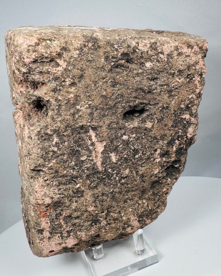 Reverse of an ancient Veracruz stone head with recessed cavities