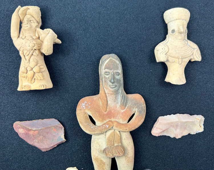 Group of authentic Mesoamerican terracotta idols and small stone objects from 300 BCE–900 CE.