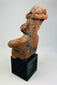 Reverse angle of Nayarit ceramic figure highlighting form and age-appropriate encrustations.
