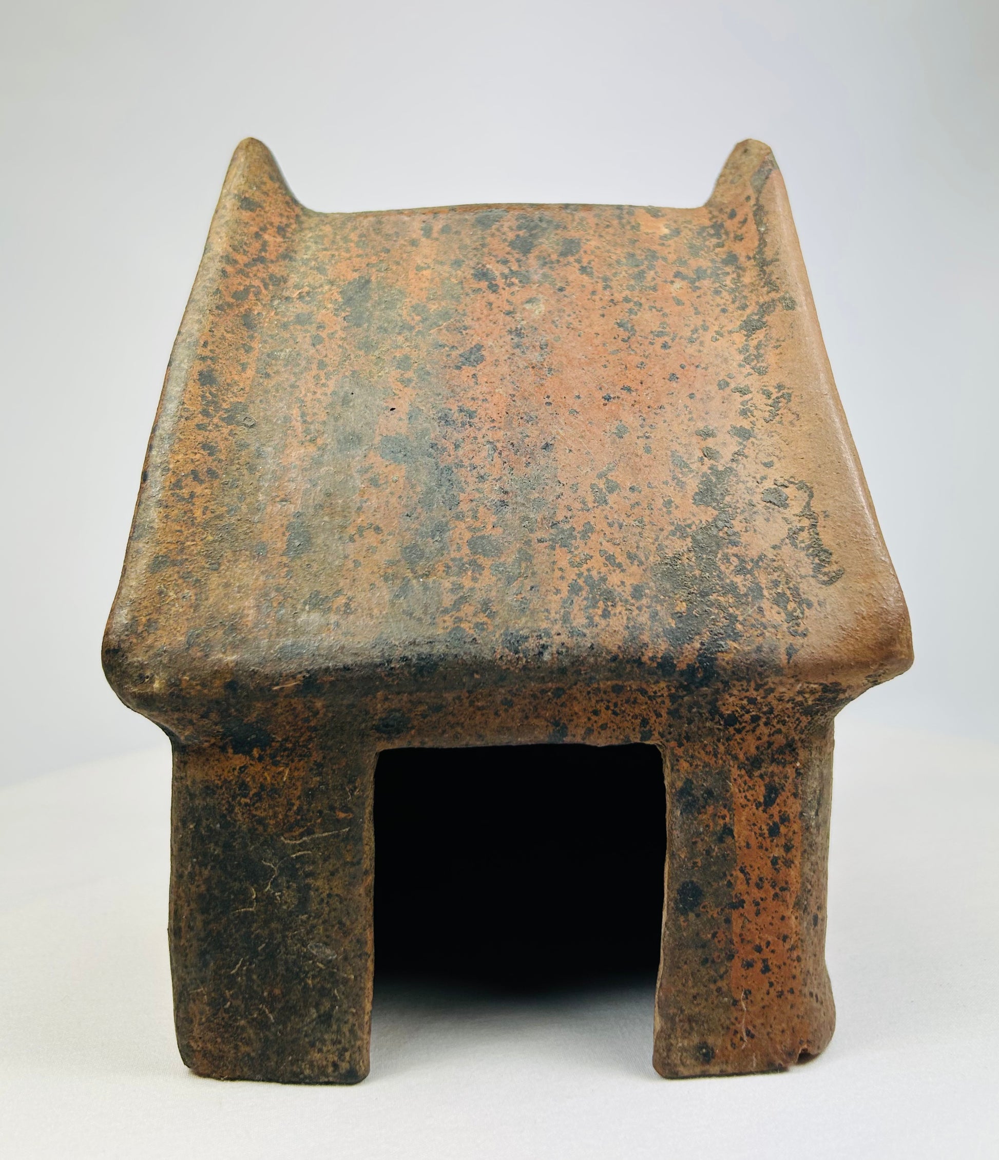 Late Formative period ceramic house model showing doorway and roof detail.