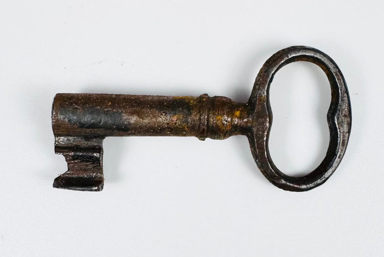Early European sliding-bar lock with three mounting staples and suspended lock body