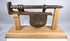 Detailed antique iron lock assembly with dark brown patina and hand-forged surfaces
