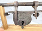 European wrought-iron sliding hasp lock with multiple forged loops and retainers
