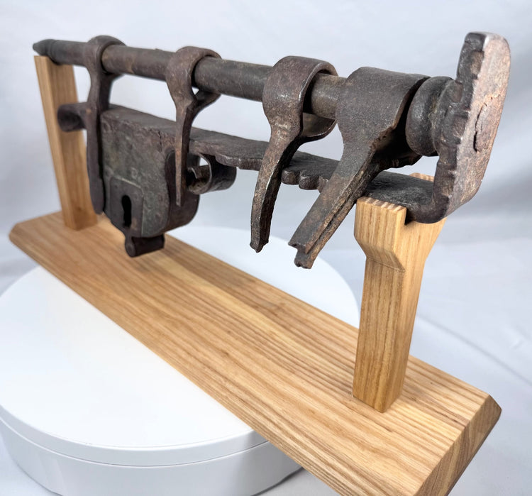 Antique gate security mechanism with multiple sliding hasps and forged retaining loops