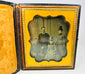 Ambrotype portrait of a Boston family from the 1860s in a yellow velvet-lined case