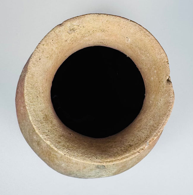 Ancient hand-formed earthenware storage jar from Central America with surviving original form