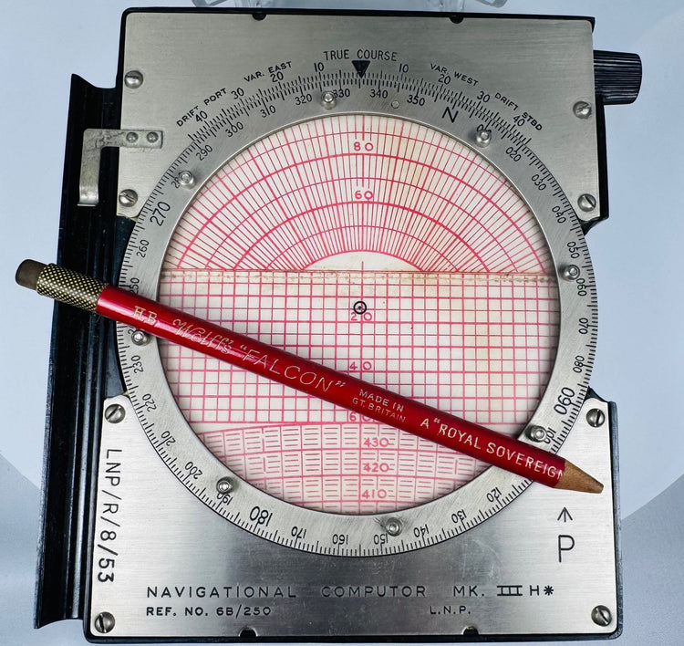 Vintage RAF aviation computer with red-and-white plotting grid