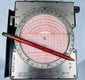 Vintage RAF aviation computer with red-and-white plotting grid