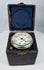 Antique engineering tachometer with glass-covered circular dial